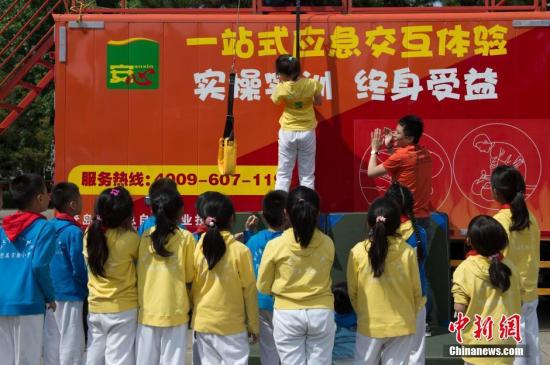 北京优质教育资源再扩大 中小学不得与房地产